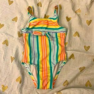 Adorable one piece toddler swim suit 🍭